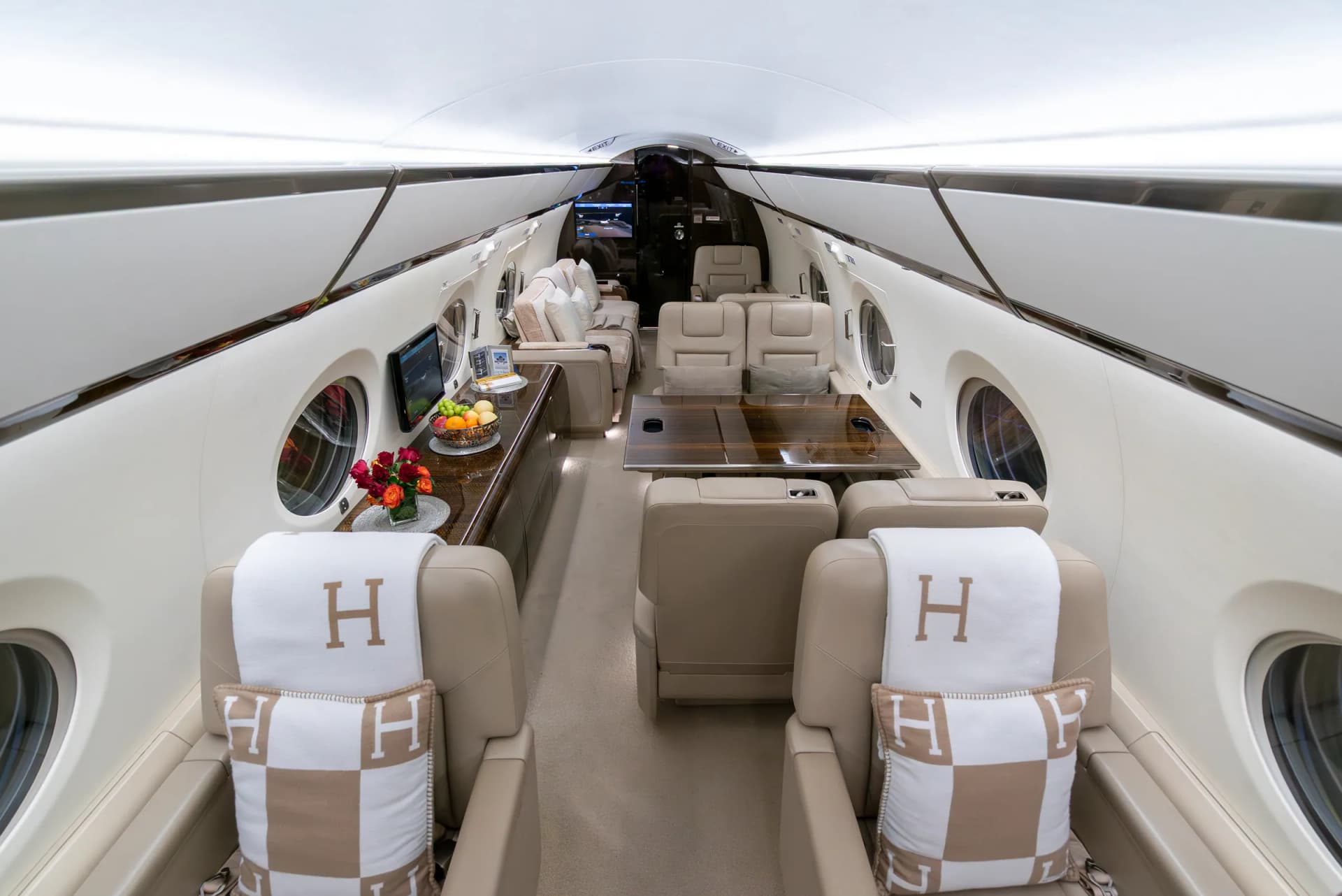 View forward through the Gulfstream G450 cabin, past the club seats, credenza and conference group