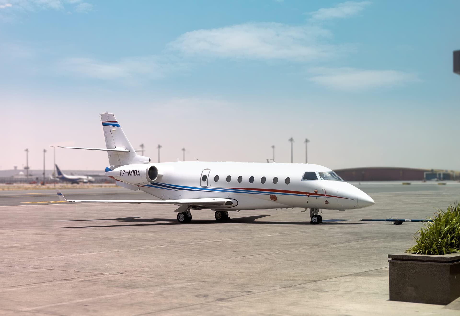 Gulfstream G200 T7-MIDA parked on the Dubai ramp